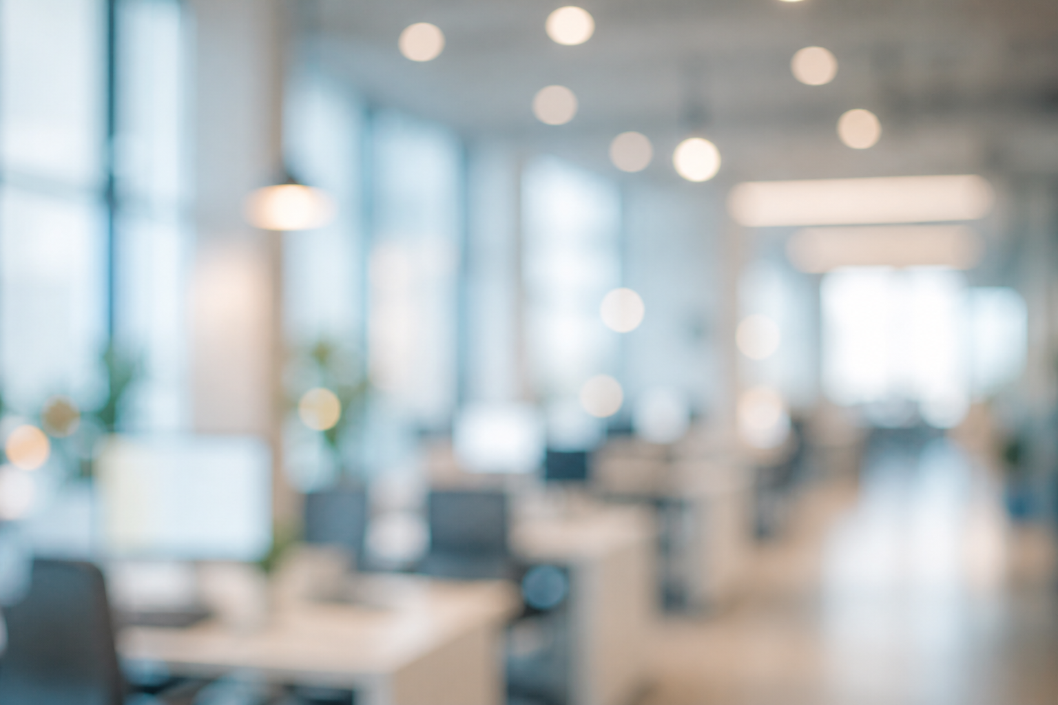 [AI IMAGE PROMPT: Abstract soft bokeh of a modern open-plan tech office, very blurred and desaturated, cool blue and warm white tones, used as a subtle background texture behind a profile card UI, no people visible, purely atmospheric]